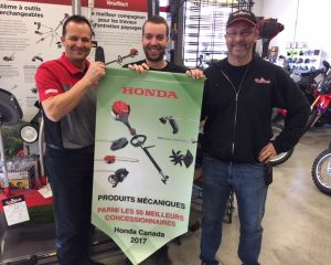 L'Ami Denis receives an award from Honda Canada